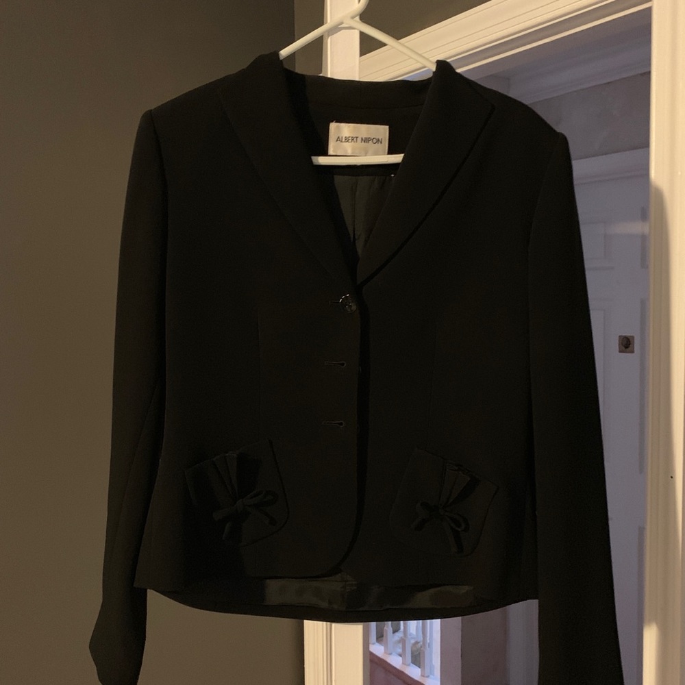 Black three-button blazer/ jacket